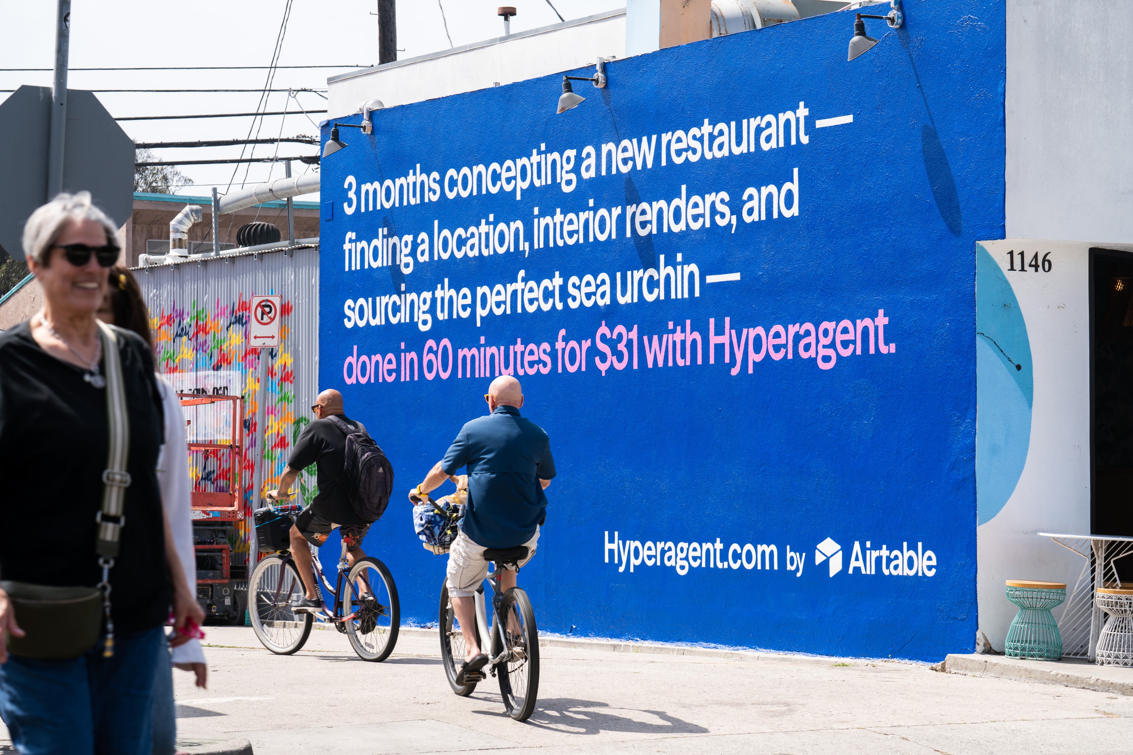 Hyperagent hand-painted campaign mural